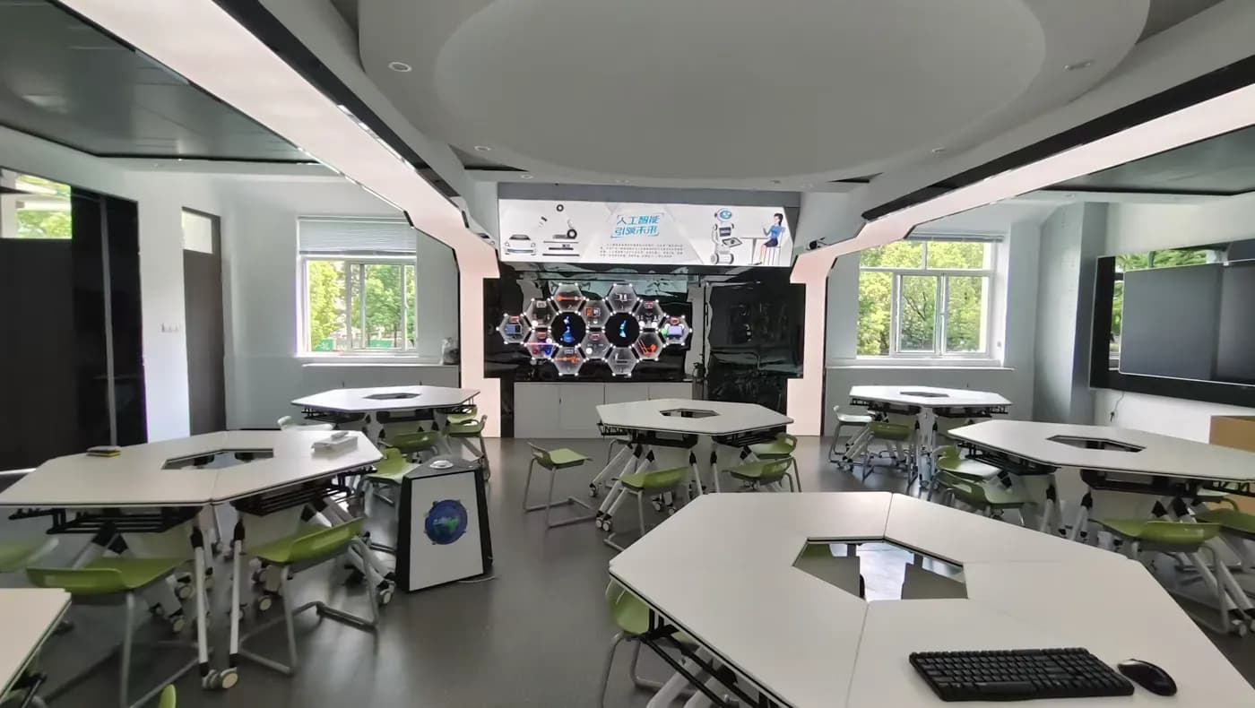 Shanghai STEAM lab with classroom tables and display wall